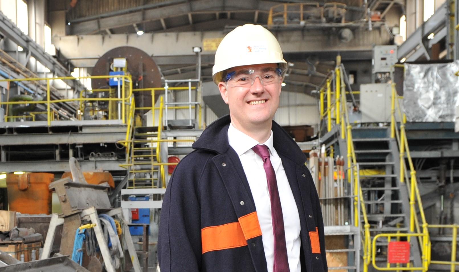 Alumnis Chris McDonald in the plant