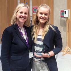Sarah Barron and her supervisor, Roisin Owens, with Sarah's award trophy